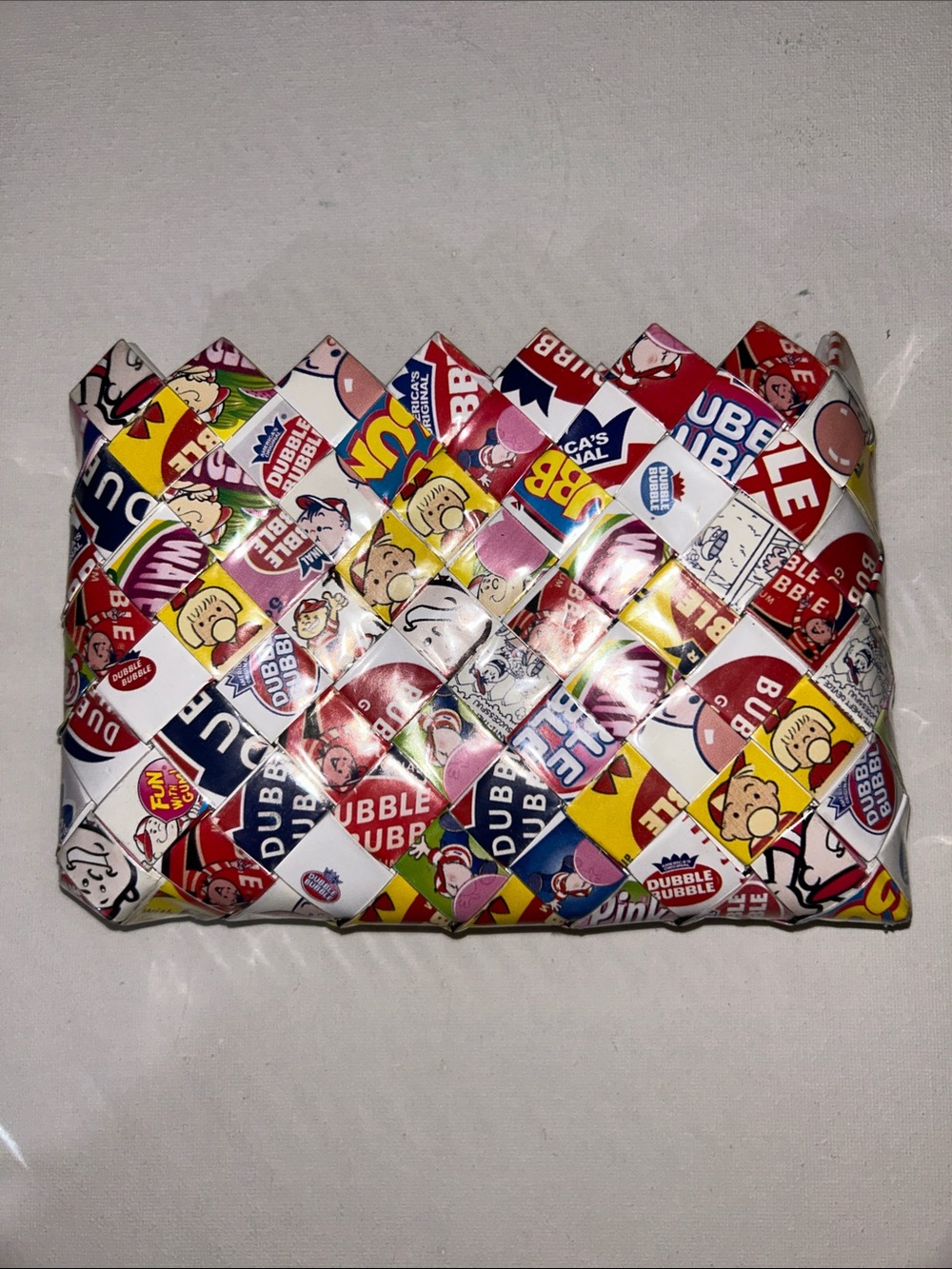 Ollin Dubble Bubble Gum Woven Clutch - Multi Color